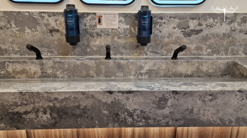 SNOAP Refillable Soap Dispenser System installed in a modern UK commercial washroom as an alternative to liquid soap dispensers.