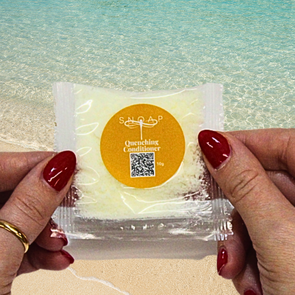 Quenching Conditioner Sweet Orange and Argan Oil SNOAP conditioner for all hair types sample on beach background