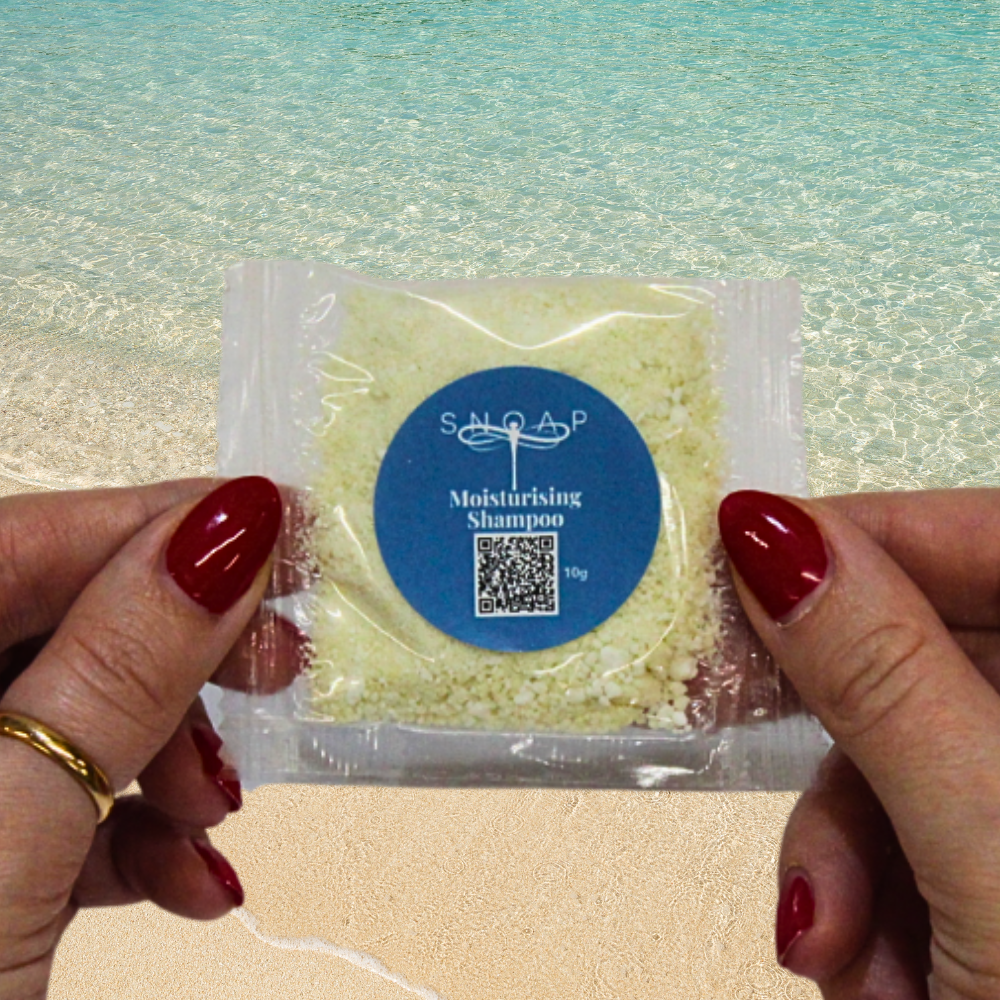 Moisturising Rosemary, Lemon & Green Clay SNOAP shampoo sample for normal hair on beach background