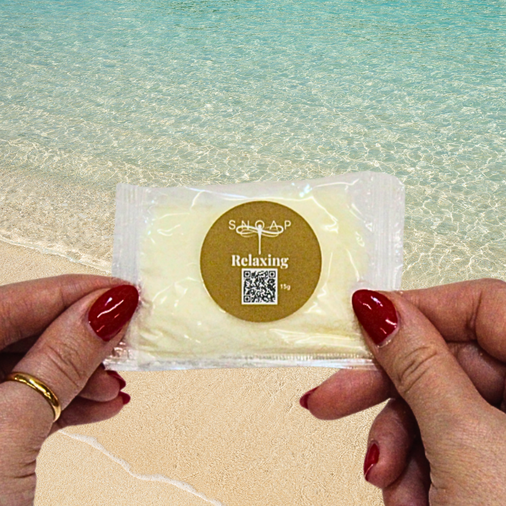 Relaxing Vetiver & Sandalwood SNOAP soap sample on beach background