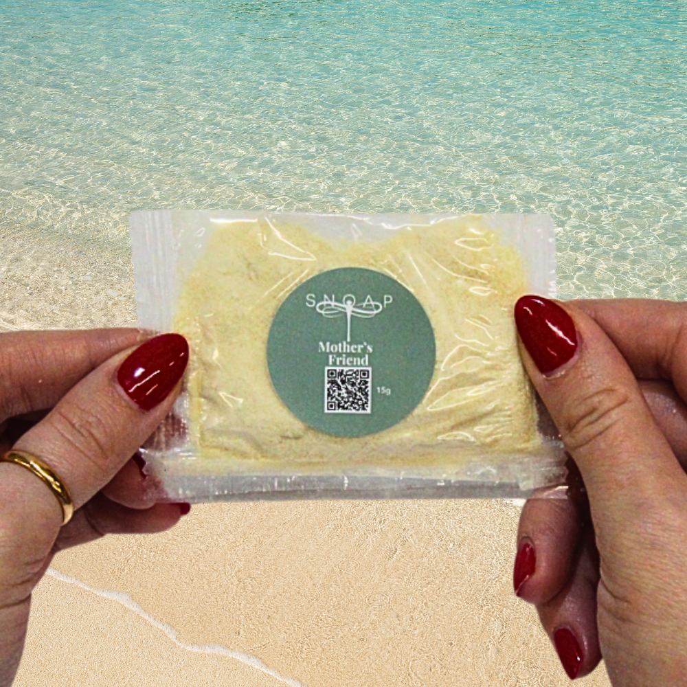 Mother's Friend Fragrance Free Organic Olive Oil SNOAP soap sample on beach background