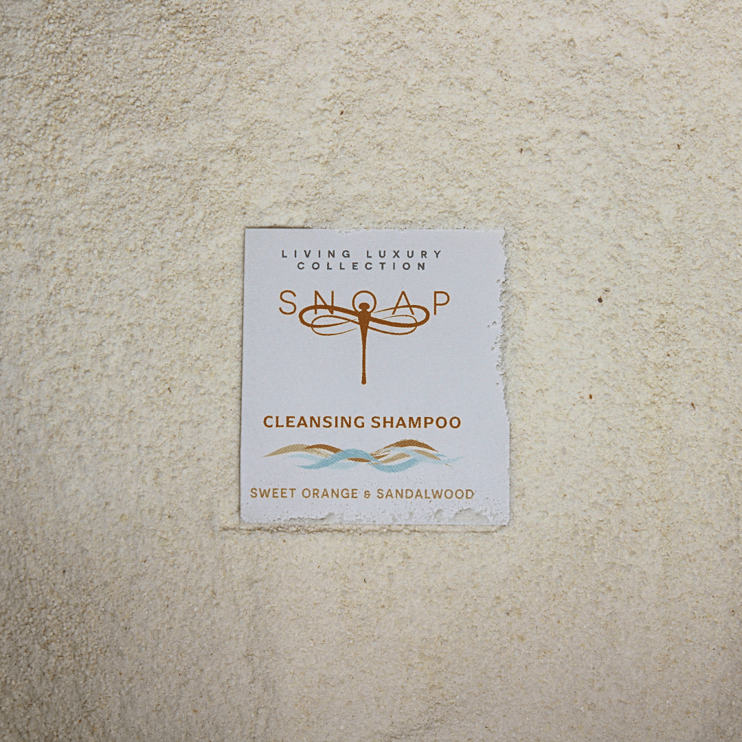 SNOAP cleansing shampoo pre ground for greasy hair in sustainable wrapping, sweet orange and sandalwood shampoo made in the UK