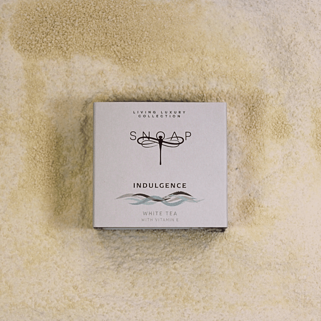 SNOAP Indulgence - White tea with vitamin E pre ground soap for luxury and skin healing in sustainable wrapping.