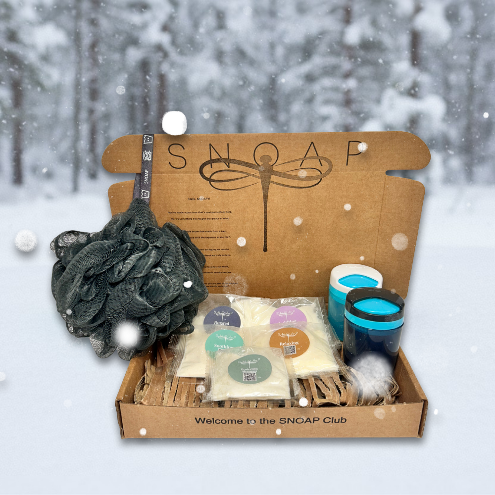 SNOAP Mini Discovery Set with four soaps, Protecting Shampoo, two dispensers, and eco shower puff