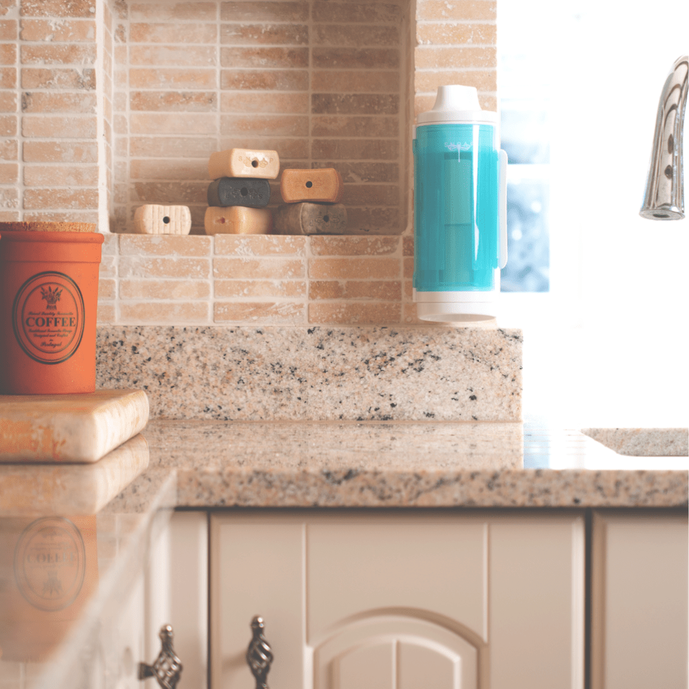 SNOAP Dispenser in white & SNOAP Blue Wall mounted in kitchen