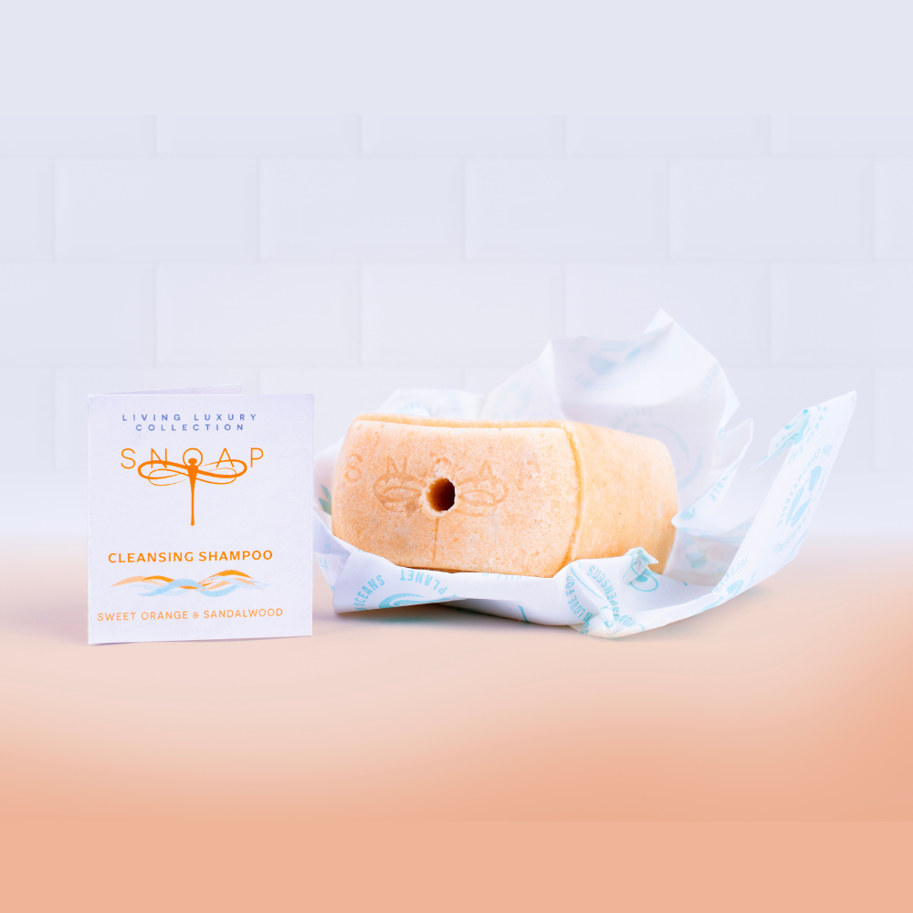 SNOAP cleansing shampoo bar for greasy hair in sustainable wrapping, sweet orange and sandalwood solid shampoo made in the UK