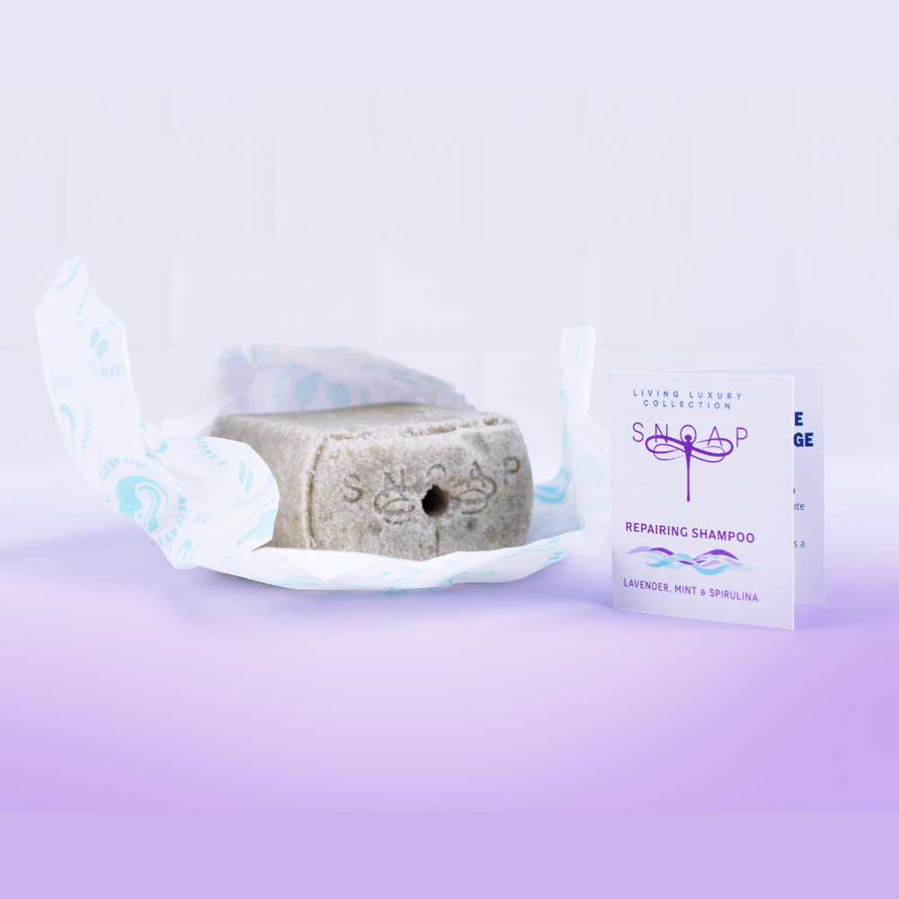 Repairing SNOAP shampoo. Infused with plant-based proteins and natural oils to restore and strengthen dry or coloured hair