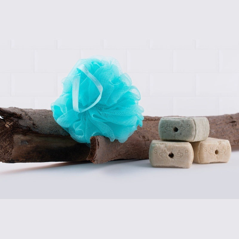 SNOAP recycled ocean plastic shower puff in SNOAP blue