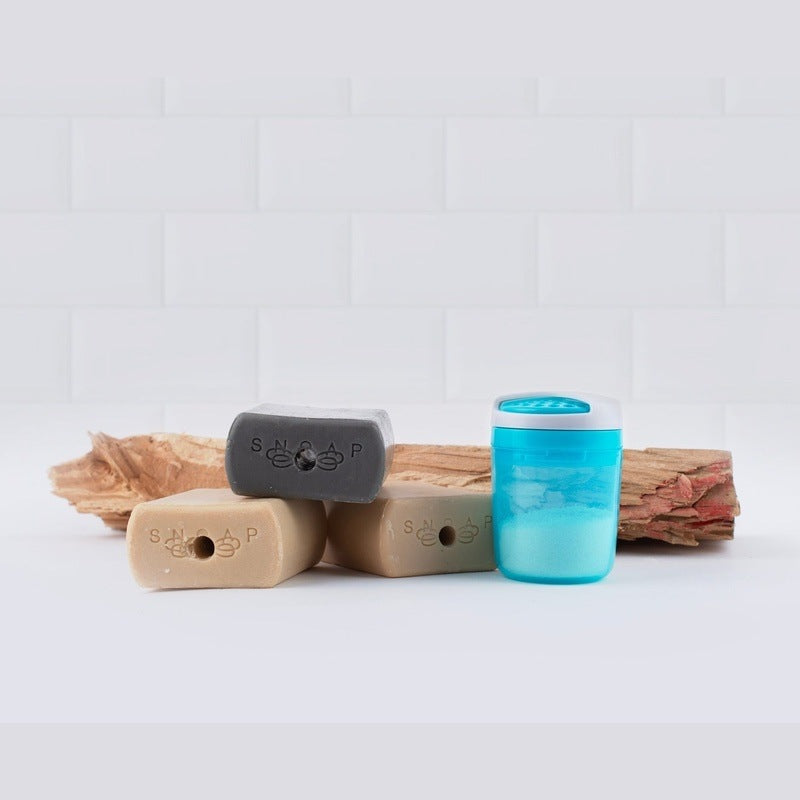 Compact refillable Theia (white and SNOAP Blue) SNOAP dispenser with twist-top design