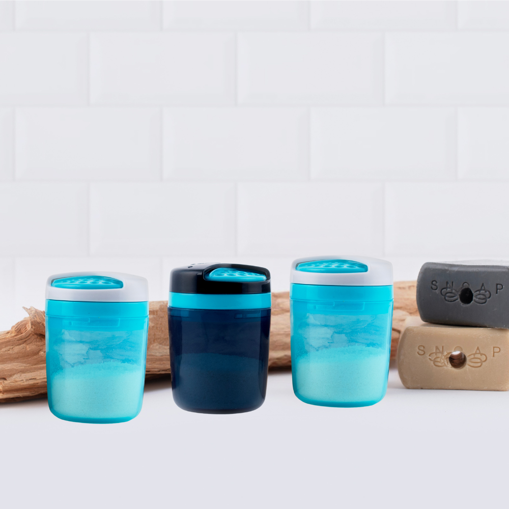 Three refillable SNOAP On The Go dispensers