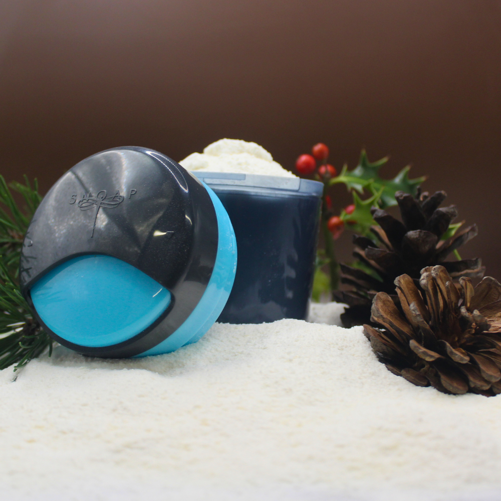 SNOAP On-The-Go dispenser in anthracite grey close-up with twist-top design