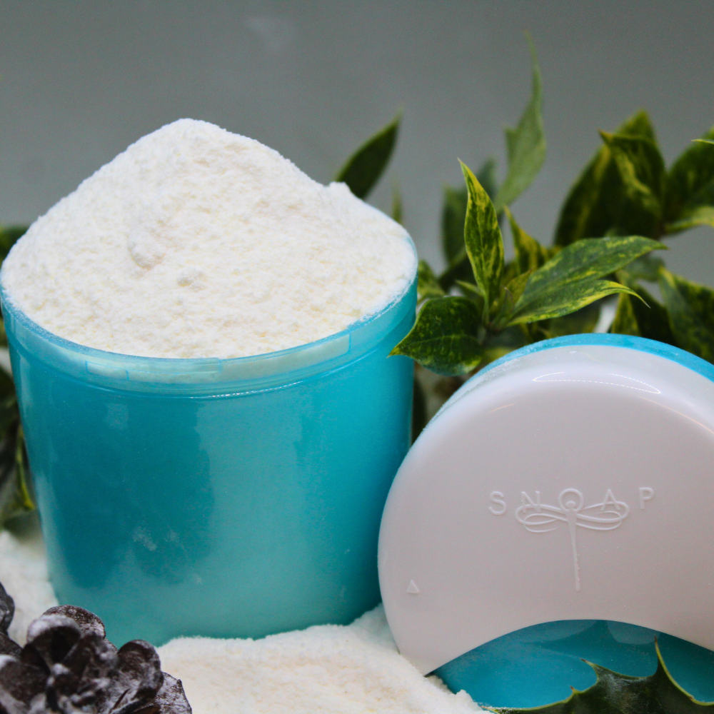 SNOAP On-The-Go dispenser in white close-up with twist-top design