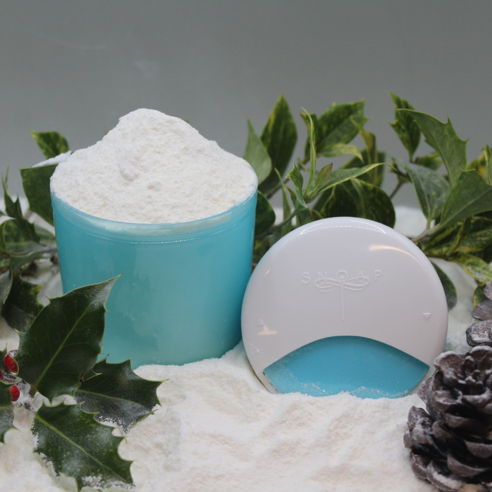 Small Theia (white and SNOAP blue) SNOAP On-The-Go dispenser filled with 30g of soap